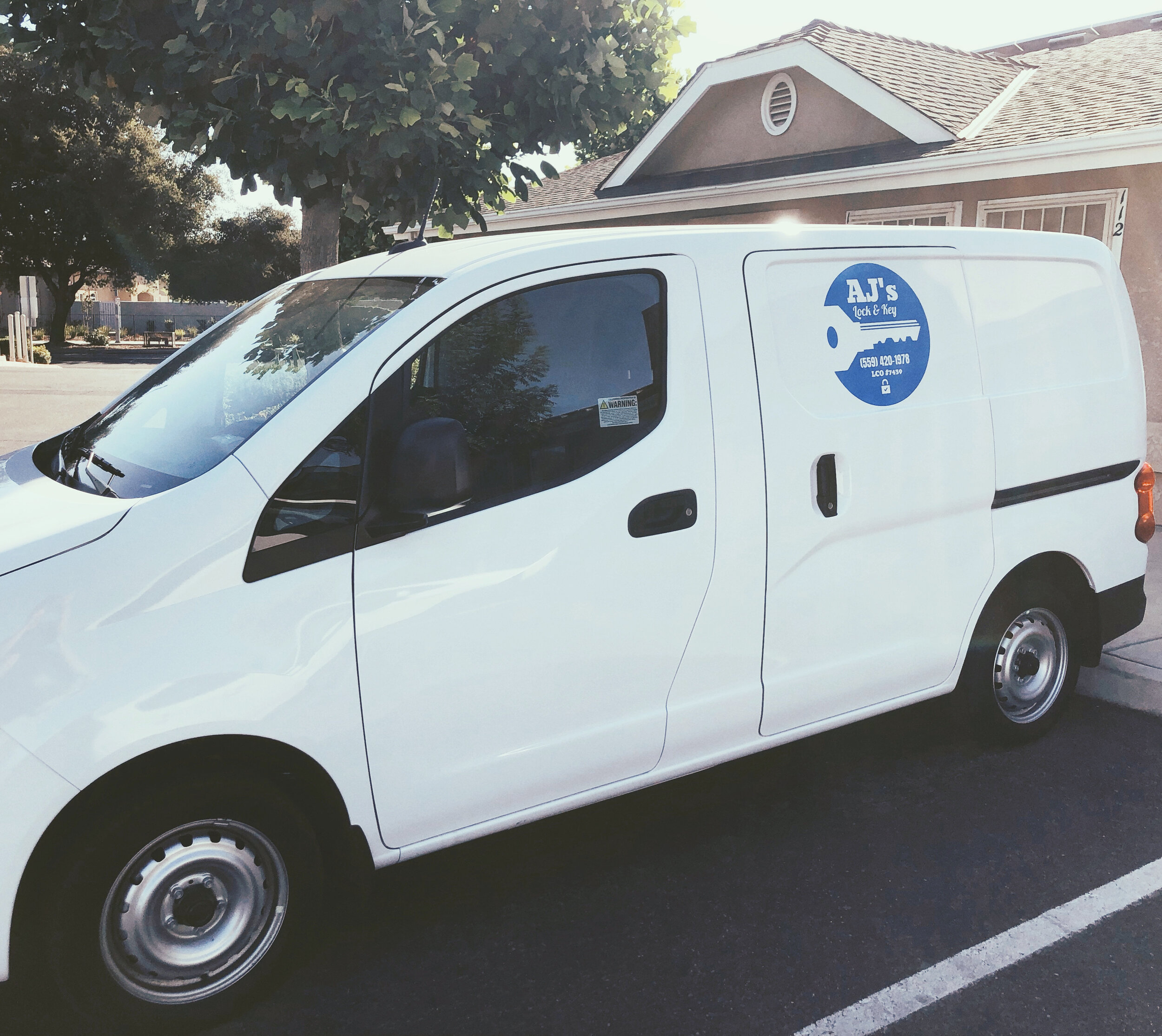 AJ's Lock & Key branded service vehicle in Fresno